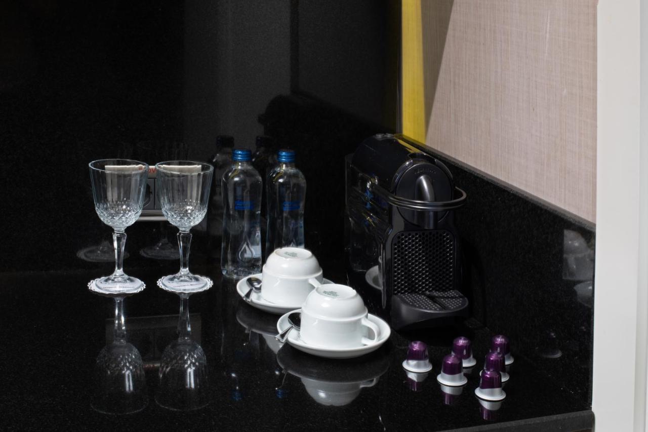 Mercure Istanbul Bomonti Exterior photo A Nespresso coffee machine in a hotel room